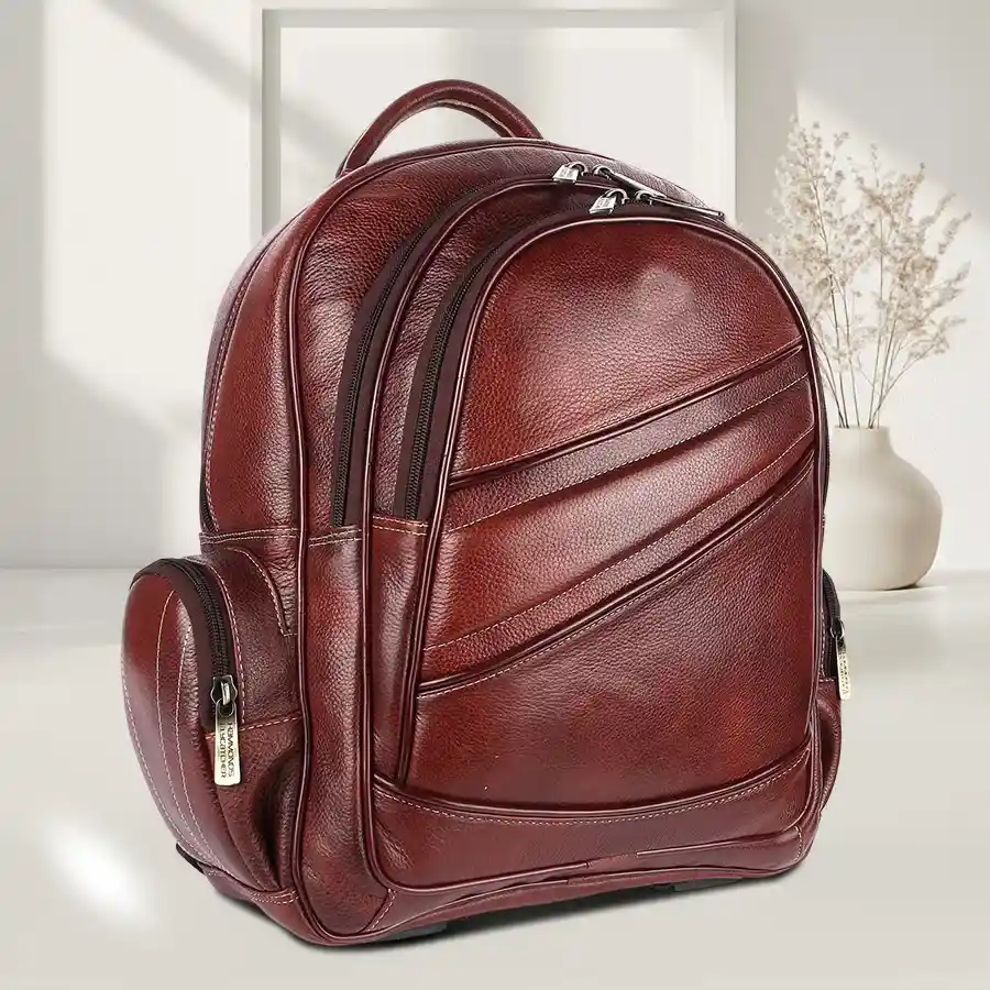 Stylish Rich Brown Leather Laptop Backpack for up to 16-inch laptops.