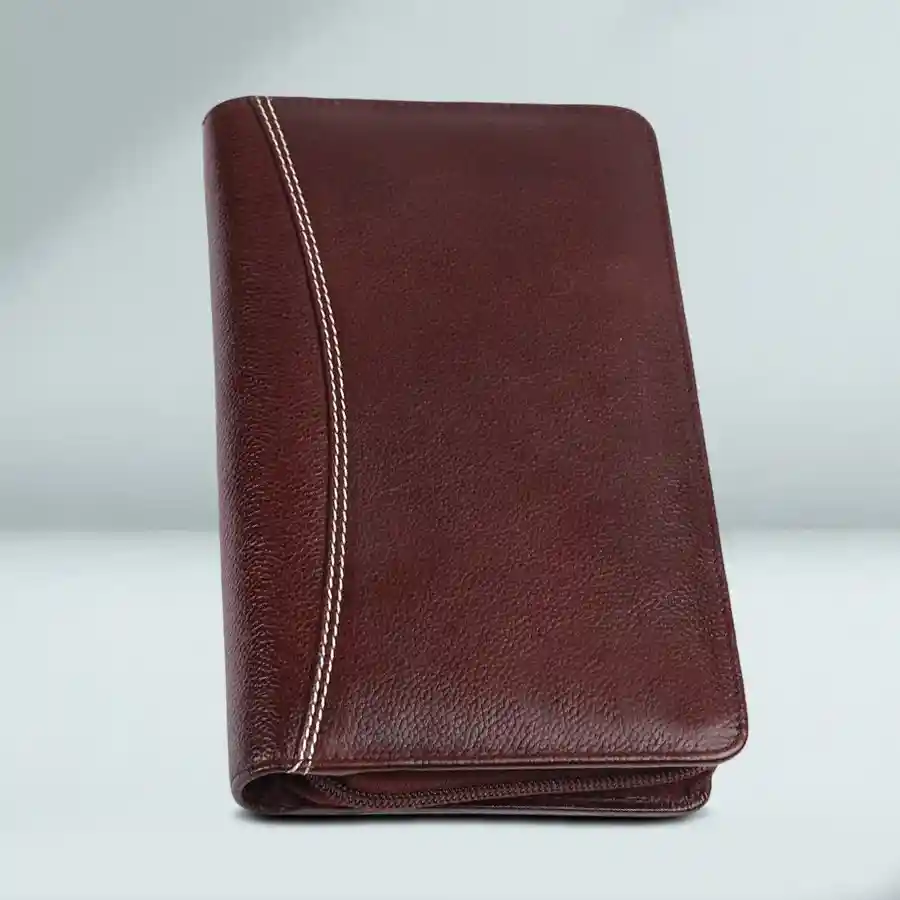 Stylish brown leather passport holder with multiple card slots, perfect for travel.