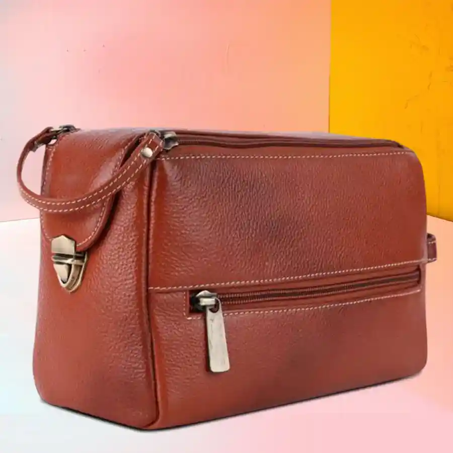 Elegant Tan Leather Toiletry Bag crafted from premium leather, featuring spacious compartments for travel essentials.